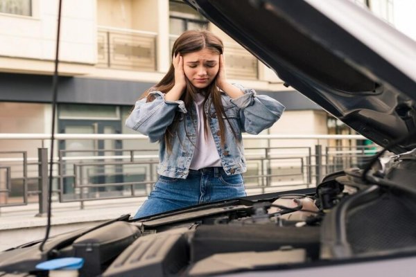 girl annoyed by long cranking car